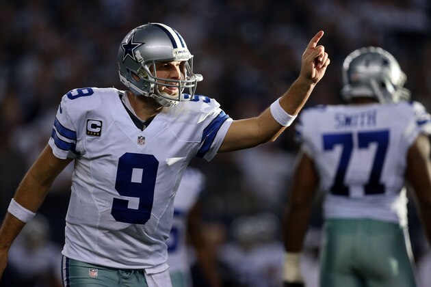 ARLINGTON, TX - JANUARY 04:  Tony Romo #9 of the Dallas Cowboys reacts against the Detroit Lions during the first half of their NFC Wild Card Playoff game at AT&T Stadium on January 4, 2015 in Arlington, Texas.  (Photo by Sarah Glenn/Getty Images)
