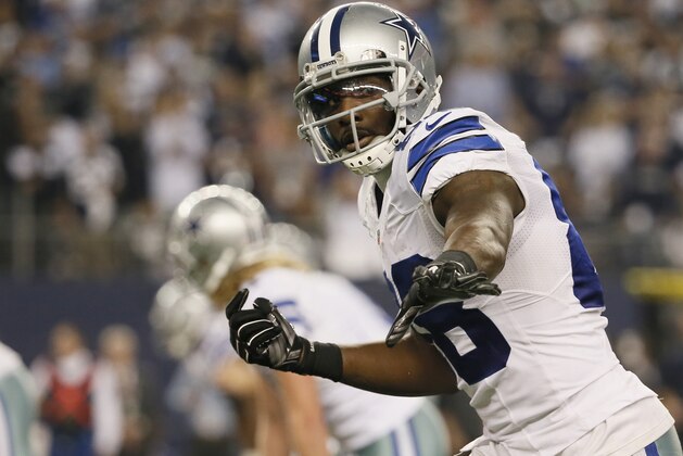 Dallas Cowboys wide receiver Dez Bryant (88) gestures before a play against the Detroit Lions during the second half of an NFL wildcard playoff football game, Sunday, Jan. 4, 2015, in Arlington, Texas. (AP Photo/Tony Gutierrez)