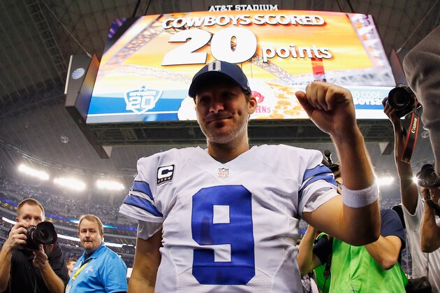 ARLINGTON, TX - JANUARY 04:  Quarterback Tony Romo #9 of the Dallas Cowboys walks off the field after the Cowboys beat the Detroit Lions 24-20 during a NFC Wild Card Playoff game at AT&T Stadium on January 4, 2015 in Arlington, Texas.  (Photo by Tom Pennington/Getty Images)
