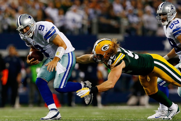 ARLINGTON, TX - DECEMBER 15: Quarterback Tony Romo #9 of the Dallas Cowboys is tackled by outside linebacker Clay Matthews #52 of the Green Bay Packers during a game at AT&T Stadium on December 15, 2013 in Arlington, Texas. (Photo by Tom Pennington/Getty Images) ARLINGTON, TX - DECEMBER 15: Quarterback Tony Romo #9 of the Dallas Cowboys is tackled by outside linebacker Clay Matthews #52 of the Green Bay Packers during a game at AT&T Stadium on December 15, 2013 in Arlington, Texas. (Photo by Tom Pennington/Getty Images)