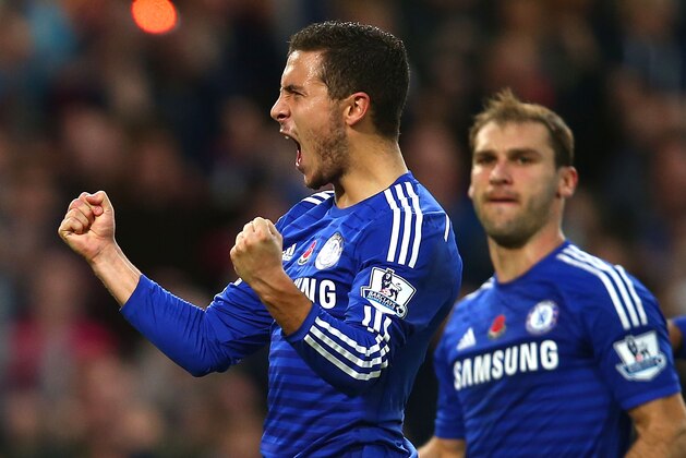 LONDON, ENGLAND - NOVEMBER 01:  Eden Hazard of Chelsea celebrates his goal during the Barclays Premier League match between Chelsea and Queens Park Rangers at Stamford Bridge on November 1, 2014 in London, England.  (Photo by Clive Rose/Getty Images)