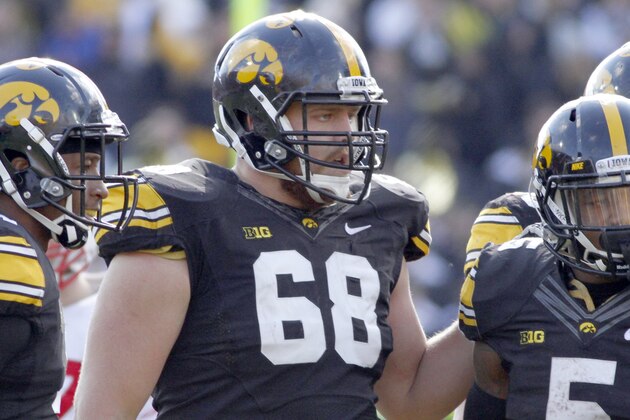 IOWA CITY, IA - NOVEMBER 2:  Offensive lineman Brandon Scherff #68 of the Iowa Hawkeyes during a break in the action in the third quarter against the Wisconsin Badgers on November 2, 2013 at Kinnick Stadium in Iowa City, Iowa. Wisconsin won 28-9. (Photo by Matthew Holst/Getty Images)