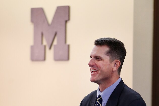 ANN ARBOR, MI - DECEMBER 30:  Jim Harbaugh speaks as he is introduced as the new Head Coach of the University of Michigan football team at the Junge Family Champions Center on December 30, 2014 in Ann Arbor, Michigan.  (Photo by Gregory Shamus/Getty Images)