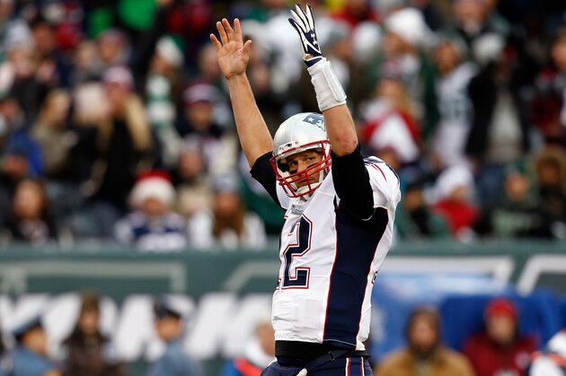 EAST RUTHERFORD, NJ - DECEMBER 21: Quarterback Tom Brady #12 of the New England Patriots celebrates a fourth quarter touchdown against the New York Jets during a game at MetLife Stadium on December 21, 2014 in East Rutherford, New Jersey. (Photo by Jeff Zelevansky/Getty Images) EAST RUTHERFORD, NJ - DECEMBER 21: Quarterback Tom Brady #12 of the New England Patriots celebrates a fourth quarter touchdown against the New York Jets during a game at MetLife Stadium on December 21, 2014 in East Rutherford, New Jersey. (Photo by Jeff Zelevansky/Getty Images)