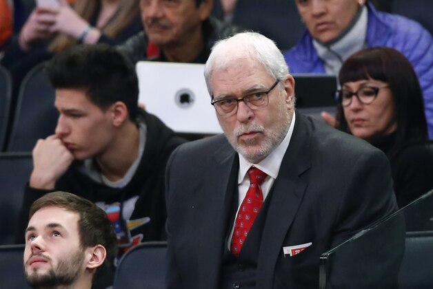 New York Knicks president Phil Jackson watches the New York Knicks lose to the Washington Wizards during an NBA basketball game at Madison Square Garden in New York, Thursday, Dec. 25, 2014. The Knicks fell to 5-26 as the Wizards defeated the Knicks 102-91. (AP Photo/Kathy Willens)