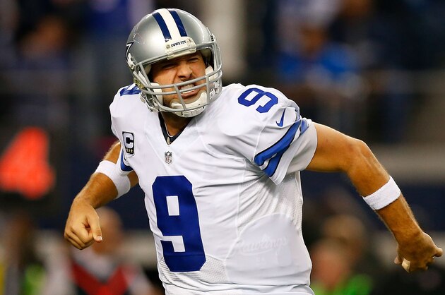 ARLINGTON, TX - JANUARY 04:  Tony Romo #9 of the Dallas Cowboys reacts after the Cowboys score against the Detroit Lions during the second half of their NFC Wild Card Playoff game at AT&T Stadium on January 4, 2015 in Arlington, Texas.  (Photo by Tom Pennington/Getty Images)