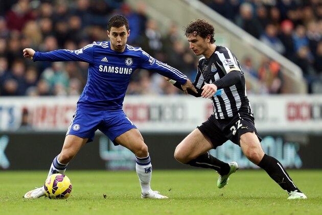 Chelsea's Eden Hazard, left, vies for the ball with Newcastle United's Daryl Janmaat during their English Premier League soccer match at St James' Park, Newcastle, England, Saturday, Dec. 6, 2014. (AP Photo/Scott Heppell) Chelsea's Eden Hazard, left, vies for the ball with Newcastle United's Daryl Janmaat during their English Premier League soccer match at St James' Park, Newcastle, England, Saturday, Dec. 6, 2014. (AP Photo/Scott Heppell)