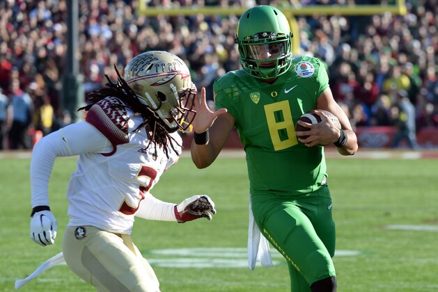 Jan 1, 2015; Pasadena, CA, USA; Florida State Seminoles cornerback Ronald Darby (3) defends against Oregon Ducks quarterback Marcus Mariota (8) in the 2015 Rose Bowl college football game at Rose Bowl. Mandatory Credit: Jayne Kamin-Oncea-USA TODAY Sports