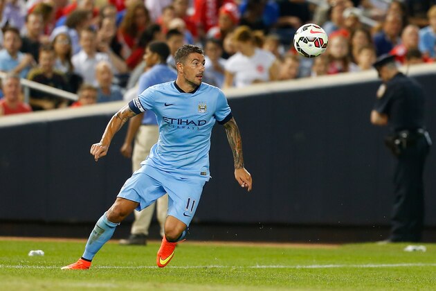 NEW YORK, NY - JULY 30:  Aleksandar Kolarov #11 of Manchester City in action against Liverpool during the International Champions Cup 2014 at Yankee Stadium on July 30, 2014 in the Bronx borough of New York City.  (Photo by Mike Stobe/Getty Images)