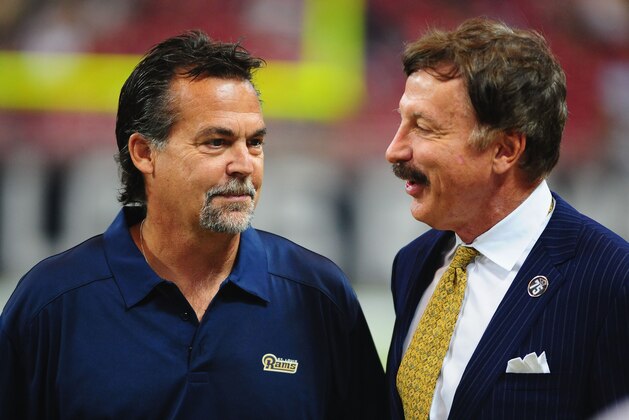 ST. LOUIS, MO - SEPTEMBER 8: Head coach Jeff Fisher of the St. Louis Rams talks with team owner Stan Kroenke prior to a game against the Arizona Cardinals at the Edward Jones Dome on September 8, 2013 in St. Louis, Missouri.  (Photo by Michael Thomas/Getty Images)