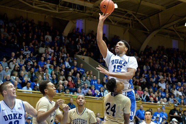 DURHAM, NC - DECEMBER 31: Jahlil Okafor #15 of the Duke Blue Devils shoots over Justin Gordon #24 of the Wofford Terriers during their game at Cameron Indoor Stadium on December 31, 2014 in Durham, North Carolina. (Photo by Grant Halverson/Getty Images)