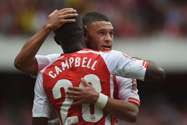 LONDON, ENGLAND - AUGUST 02: Joel Campbell of Arsenal celebrates his goal with team mate Alex Oxlade-Chamberlain during the Emirates Cup match between Arsenal and Benfica at the Emirates Stadium on August 2, 2014 in London, England.  (Photo by Michael Regan/Getty Images)