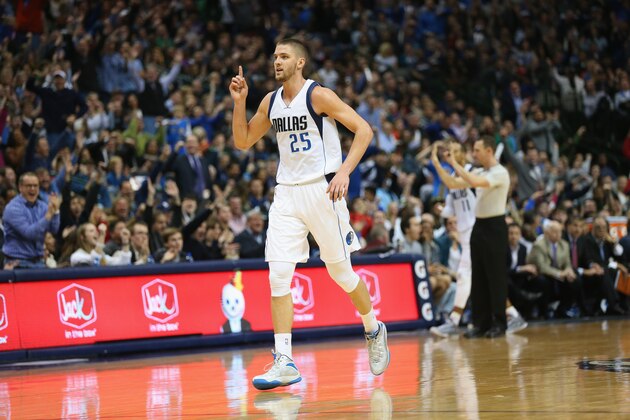DALLAS, TX - DECEMBER 30:  Chandler Parsons #25 of the Dallas Mavericks reacts after being fouled against the Washington Wizards at American Airlines Center on December 30, 2014 in Dallas, Texas.  NOTE TO USER: User expressly acknowledges and agrees that, by downloading and or using this photograph, User is consenting to the terms and conditions of the Getty Images License Agreement.  (Photo by Ronald Martinez/Getty Images)