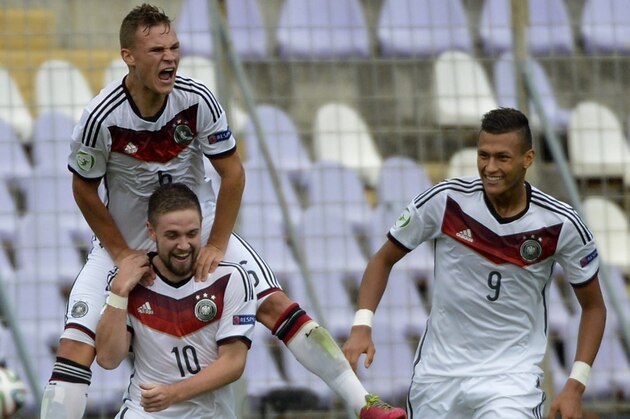 Marc Stendera of Germany, left no. 10, celebrates with teammates Joshua Kimmich, above, and Davie Selke after scoring against Austria during their U19 European Championship semifinal match in Szusza Ferenc Stadium in Budapest, Hungary, Monday July 28, 2014. (AP Photo/MTI, Tibor Illyes)
