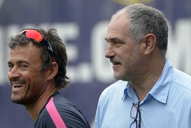 FC Barcelona's head coach Luis Enrique, left, and FC Sports director Andoni Zubizarreta smile prior of a training session at the Sports Center FC Barcelona Joan Gamper in San Joan Despi, Spain, Friday, July 25, 2014. (AP Photo/Manu Fernandez)