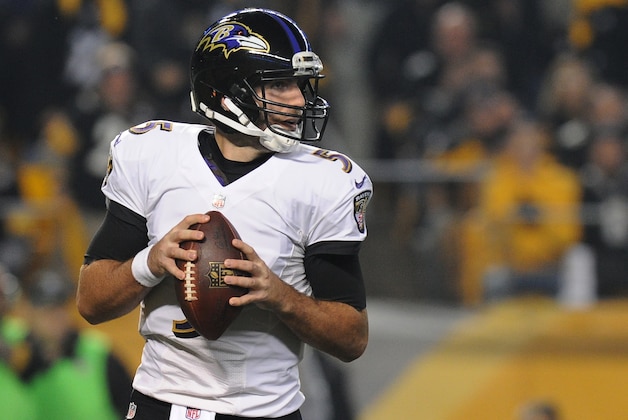 Baltimore Ravens quarterback Joe Flacco (5) passes in the first quarter an NFL wildcard playoff football game against the Pittsburgh Steelers, Saturday, Jan. 3, 2015, in Pittsburgh. (AP Photo/Don Wright)