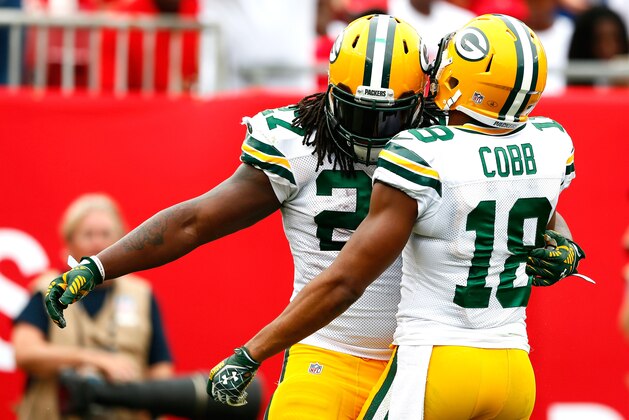 TAMPA, FL - DECEMBER 21:  Eddie Lacy #27 of the Green Bay Packers celebrates his touchdown against the Tampa Bay Buccaneers with Randall Cobb #18 at Raymond James Stadium on December 21, 2014 in Tampa, Florida.  (Photo by Kevin C. Cox/Getty Images)