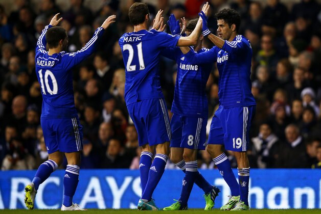 LONDON, ENGLAND - JANUARY 01:  Diego Costa of Chelsea celebrates with team-mates after scoring the opening goal during the Barclays Premier League match between Tottenham Hotspur and Chelsea at White Hart Lane on January 1, 2015 in London, England.  (Photo by Clive Rose/Getty Images)