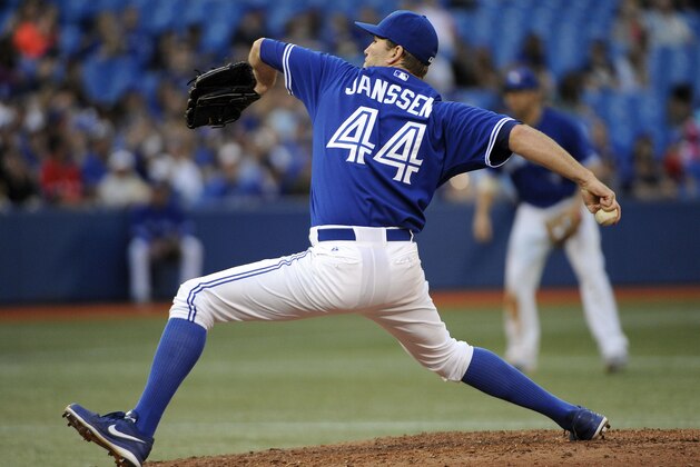 Sep 27, 2014; Toronto, Ontario, CAN; Toronto Blue Jays relief pitcher Casey Janssen (44) pitches against Baltimore Orioles in the ninth inning at Rogers Centre. Blue Jays won 4-2. Mandatory Credit: Peter Llewellyn-USA TODAY Sports