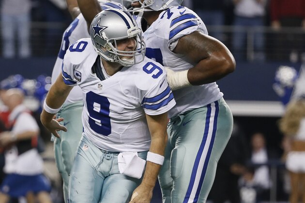 Dallas Cowboys quarterback Tony Romo (9) celebrates a touchdown against the Detroit Lions as tackle Tyron Smith (77) helps him up during the second half of an NFL wildcard playoff football game, Sunday, Jan. 4, 2015, in Arlington, Texas. (AP Photo/Tony Gutierrez) Dallas Cowboys quarterback Tony Romo (9) celebrates a touchdown against the Detroit Lions as tackle Tyron Smith (77) helps him up during the second half of an NFL wildcard playoff football game, Sunday, Jan. 4, 2015, in Arlington, Texas. (AP Photo/Tony Gutierrez)