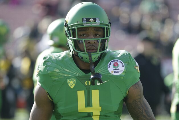 Oregon defensive back Erick Dargan warms up before the Rose Bowl NCAA college football playoff semifinal against Florida State, Thursday, Jan. 1, 2015 in Pasadena, Calif. (AP Photo/Jae C. Hong)