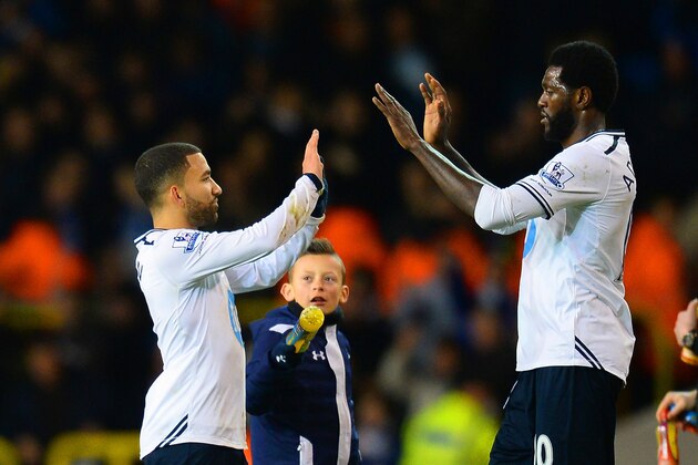 LONDON, ENGLAND - MARCH 02:  Aaron Lennon of Tottenham Hotspur high fives Emmanuel Adebayor of Tottenham Hotspur during the Barclays Premier League match between Tottenham Hotspur and Cardiff City at White Hart Lane on March 2, 2014 in London, England.  (Photo by Mike Hewitt/Getty Images)