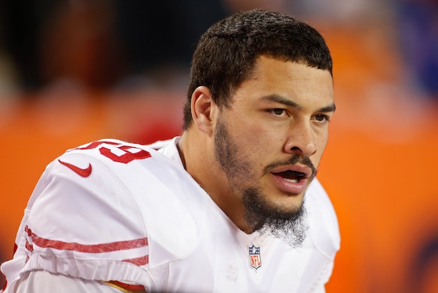 Oct 19, 2014; Denver, CO, USA; San Francisco 49ers linebacker Aaron Lynch (59) during the game against the Denver Broncos at Sports Authority Field at Mile High. Mandatory Credit: Chris Humphreys-USA TODAY Sports