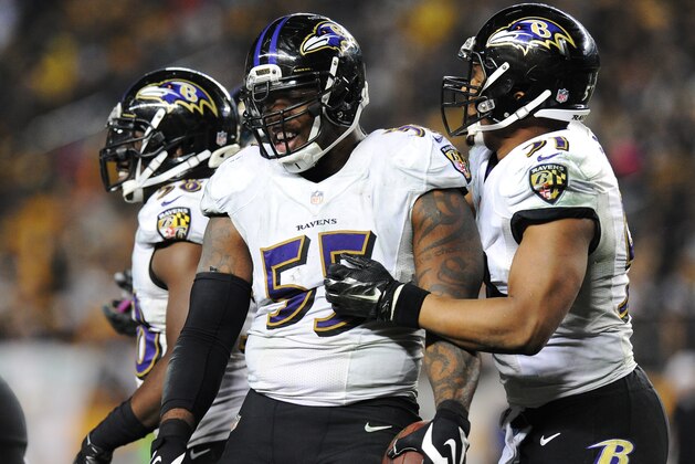 Baltimore Ravens outside linebacker Terrell Suggs (55) celebrates after intercepting a pass by Pittsburgh Steelers quarterback Ben Roethlisberger (7) in the fourth quarter of an NFL wildcard playoff football game, Saturday, Jan. 3, 2015, in Pittsburgh. (AP Photo/Don Wright)