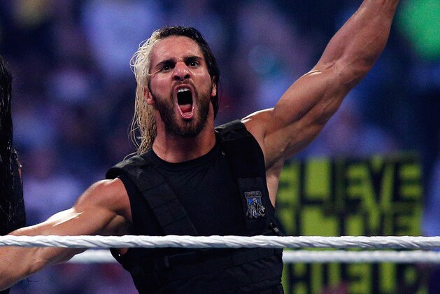 The Shield reacts after their win during Wrestlemania XXX at the Mercedes-Benz Super Dome in New Orleans on Sunday, April 6, 2014. (Jonathan Bachman/AP Images for WWE)