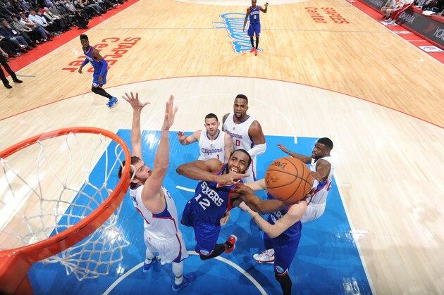 LOS ANGELES, CA -  JANUARY 3: Luc Richard Mbah a Moute #12 of the Philadelphia 76ers goes for the lay up against the Los Angeles Clippers during the game on January 3, 2015 at STAPLES CENTER in Los Angeles, California, NOTE TO USER: User expressly acknowledges and agrees that, by downloading and or using this Photograph, user is consenting to the terms and conditions of the Getty Images License Agreement. Mandatory Copyright Notice: Copyright 2015 NBAE (Photo by Juan O'Campo/NBAE via Getty Images)