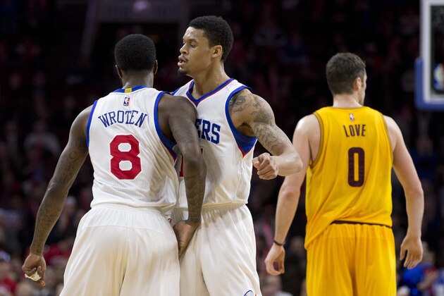 PHILADELPHIA, PA - JANUARY 5: Tony Wroten #8 and K.J. McDaniels #14 of the Philadelphia 76ers react in front of Kevin Love #0 of the Cleveland Cavaliers on January 5, 2015 at the Wells Fargo Center in Philadelphia, Pennsylvania. The 76ers defeated the Cavaliers 95-92 NOTE TO USER: User expressly acknowledges and agrees that, by downloading and or using this photograph, User is consenting to the terms and conditions of the Getty Images License Agreement (Photo by Mitchell Leff/Getty Images)