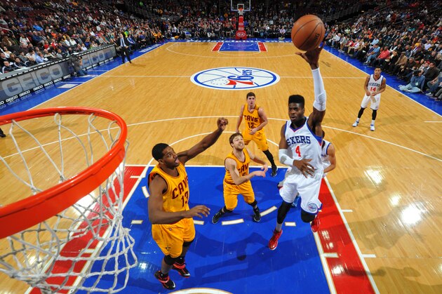 PHILADELPHIA, PA - JANUARY 5:  Nerlens Noel #4 of the Philadelphia 76ers goes up for the layup against the Cleveland Cavaliers at Wells Fargo Center on January 5, 2015 in Philadelphia, Pennsylvania NOTE TO USER: User expressly acknowledges and agrees that, by downloading and/or using this Photograph, user is consenting to the terms and conditions of the Getty Images License Agreement. Mandatory Copyright Notice: Copyright 2015 NBAE (Photo by David Dow/NBAE via Getty Images)
