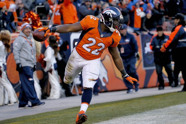 FILE - In this Dec. 28, 2014, file photo, Denver Broncos running back C.J. Anderson celebrates his touchdown against the Oakland Raiders during the second half of an NFL football game in Denver. The Broncos aren't the revving engine like last season, when they roared into the playoffs behind Peyton Manning. Now it's as much about C.J. Anderson's legs as it is Manning's right arm. (AP Photo/Jack Dempsey, File)