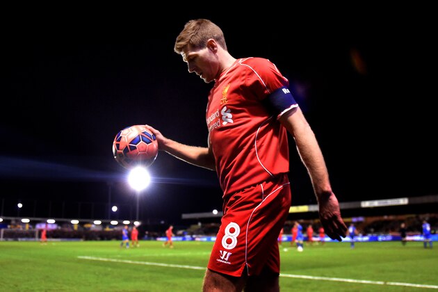 KINGSTON UPON THAMES, ENGLAND - JANUARY 05:  Steven Gerrard of Liverpool prepares to take a corner during the FA Cup Third Round match between AFC Wimbledon and Liverpool at The Cherry Red Records Stadium on January 5, 2015 in Kingston upon Thames, England.  (Photo by Michael Regan/Getty Images)