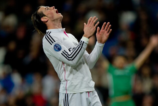 MADRID, SPAIN - DECEMBER 09: Gareth Bale of Real Madrid CF reacts as he fail to score during the UEFA Champions League Group B match between Real Madrid CF and PFC Ludogorets Razgrad at Estadio Santiago Bernabeu on December 9, 2014 in Madrid, Spain.  (Photo by Gonzalo Arroyo Moreno/Getty Images)