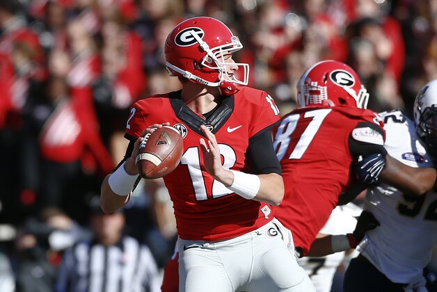 Georgia quarterback Brice Ramsey (12) throws against the Charleston Southern  in the second half of an NCAA college football game  Saturday, Nov. 22, 2014, in Athens, Ga.  Georgia won 55-9.  (AP Photo/John Bazemore)