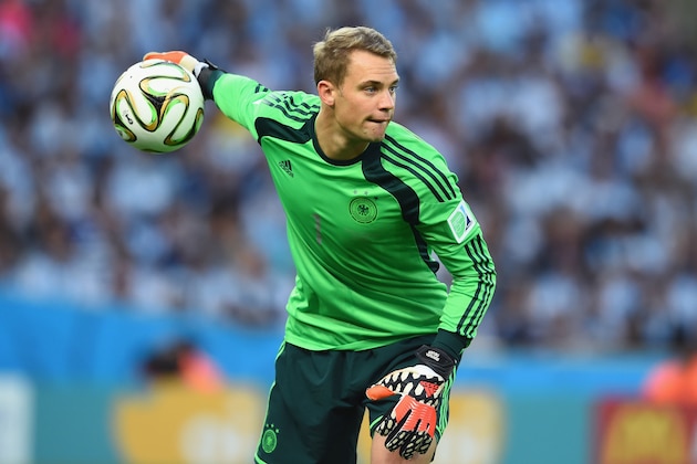 RIO DE JANEIRO, BRAZIL - JULY 13:  Goalkeeper Manuel Neuer of Germany controls the ball during the 2014 FIFA World Cup Brazil Final match between Germany and Argentina at Maracana on July 13, 2014 in Rio de Janeiro, Brazil.  (Photo by Matthias Hangst/Getty Images)