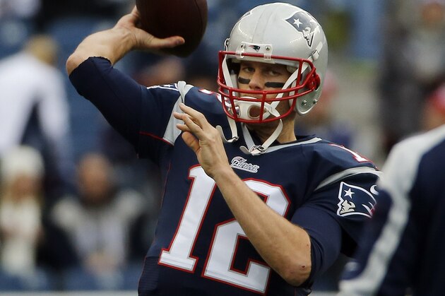 New England Patriots quarterback Tom Brady warms up before an NFL football game against the Buffalo Bills Sunday, Dec. 28, 2014, in Foxborough, Mass. (AP Photo/Elise Amendola)