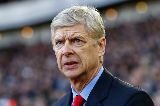 LONDON, ENGLAND - DECEMBER 28:  Arsene Wenger, manager of Arsenal looks on before the Barclays Premier League match between West Ham United and Arsenal at Boleyn Ground on December 28, 2014 in London, England.  (Photo by Julian Finney/Getty Images)