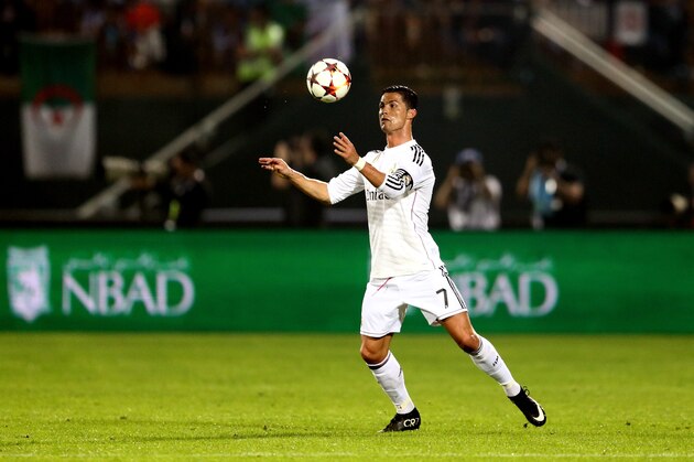 DUBAI, UNITED ARAB EMIRATES - DECEMBER 30:  Christiano Ronaldo of Real Madrid in action during the Dubai Football Challenge match between AC Milan and Real Madrid at The Sevens Stadium on December 30, 2014 in Dubai, United Arab Emirates.  (Photo by Warren Little/Getty Images)