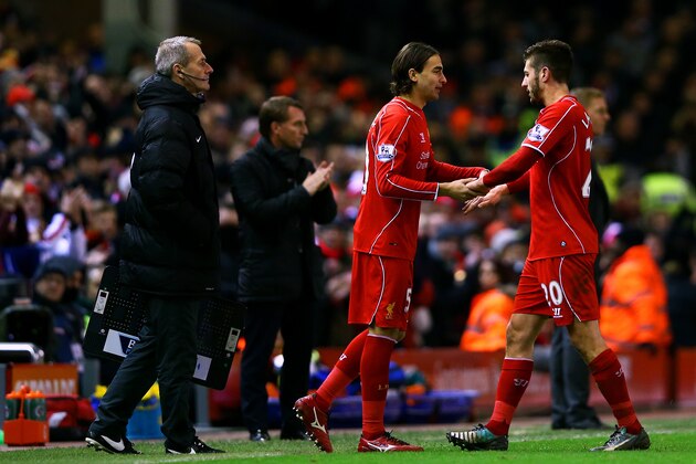 LIVERPOOL, ENGLAND - DECEMBER 29:  Adam Lallana of Liverpool is substituted for Lazar Markovic of Liverpool during the Barclays Premier League match between Liverpool and Swansea City at Anfield on December 29, 2014 in Liverpool, England.  (Photo by Clive Brunskill/Getty Images)