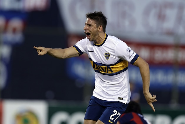 Jonathan Calleri of Argentina's Boca Juniors celebrates his goal against Paraguay's Cerro Porteno at a Copa Sudamericana soccer match in Asuncion, Paraguay, Thursday, Nov. 6. 2014.(AP Photo/Jorge Saenz)