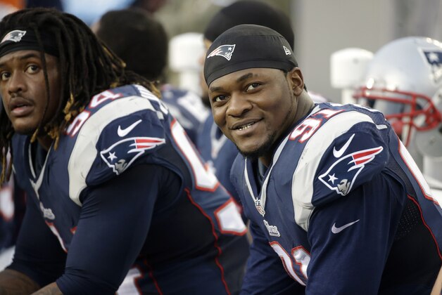 New England Patriots outside linebacker Dont'a Hightower, left, and outside linebacker Jamie Collins, right, in the second half of an NFL football game against the Detroit Lions, Sunday, Nov. 23, 2014, in Foxborough, Mass. (AP Photo/Steven Senne)