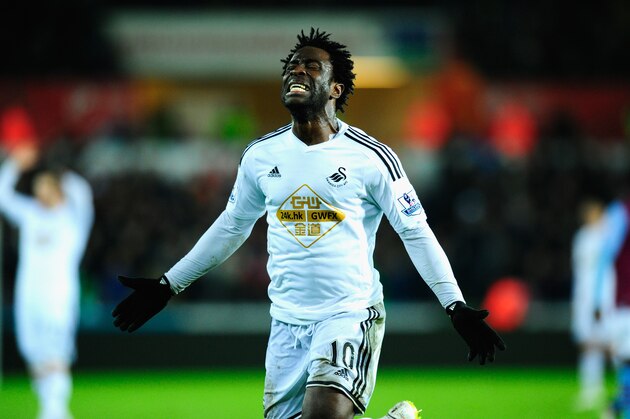 SWANSEA, WALES - DECEMBER 26:  Wilfried Bony of Swansea reacts after having a goal dissalowed during the Barclays Premier League match between Swansea City and Aston Villa at Liberty Stadium on December 26, 2014 in Swansea, Wales.  (Photo by Stu Forster/Getty Images)
