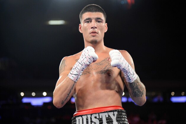Jul 26, 2014; New York, NY, USA; Dusty Hernadez-Harrison (silver trunks) after defeating Wilfredo Acuna (not pictured) in their WBC Youth welterweight title bout at Madison Square Garden. Harrison won via unanimous decision. Mandatory Credit: Joe Camporeale-USA TODAY Sports