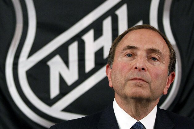 FILE - In this Sept. 13, 2012, file photo, NHL hockey commissioner Gary Bettman listens as he meets with reporters after a meeting with team owners, in New York. The NHL locked out its players at midnight Saturday, becoming the third major sports league to impose a work stoppage in the last 18 months. The action also marks the fourth shutdown for the NHL since 1992, including a year-long dispute that forced the cancellation of the entire 2004-05 season when the league held out for a salary cap. The deal which ended that dispute expired at midnight, and Commissioner Gary Bettman followed through on his longstanding pledge to lock out the players with no new agreement in place. (AP Photo/Mary Altaffer, File) FILE - In this Sept. 13, 2012, file photo, NHL hockey commissioner Gary Bettman listens as he meets with reporters after a meeting with team owners, in New York. The NHL locked out its players at midnight Saturday, becoming the third major sports league to impose a work stoppage in the last 18 months. The action also marks the fourth shutdown for the NHL since 1992, including a year-long dispute that forced the cancellation of the entire 2004-05 season when the league held out for a salary cap. The deal which ended that dispute expired at midnight, and Commissioner Gary Bettman followed through on his longstanding pledge to lock out the players with no new agreement in place. (AP Photo/Mary Altaffer, File)