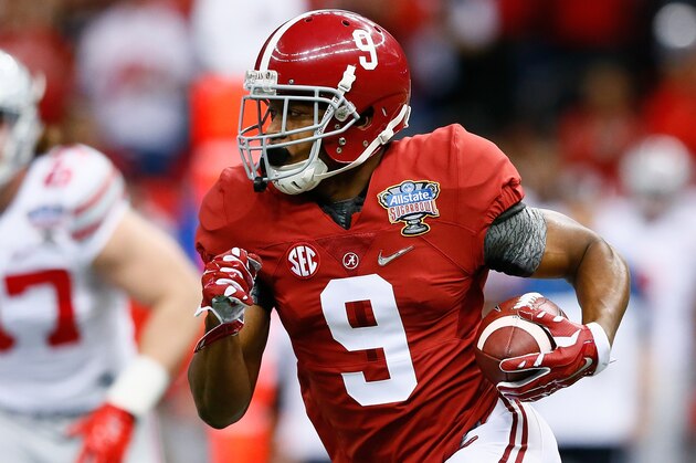 NEW ORLEANS, LA - JANUARY 01:  Amari Cooper #9 of the Alabama Crimson Tide runs the ball in the first quarter against the Ohio State Buckeyes during the All State Sugar Bowl at the Mercedes-Benz Superdome on January 1, 2015 in New Orleans, Louisiana.  (Photo by Kevin C. Cox/Getty Images)