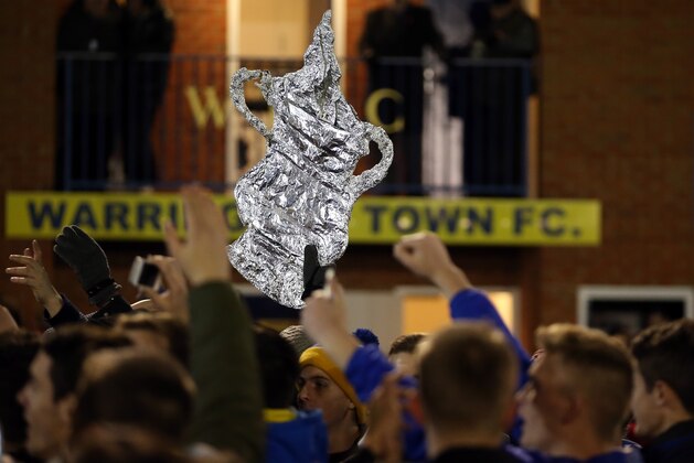 WARRINGTON, ENGLAND - NOVEMBER 07:  Warrington fans celebrate at the final whistle during the FA Cup First Round match between Warrington Town and Exeter City at Cantilever Park on November 7, 2014 in Warrington, England.  (Photo by Jan Kruger/Getty Images)