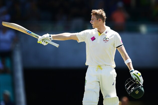 SYDNEY, AUSTRALIA - JANUARY 07:  Steve Smith of Australia celebrates and acknowledges the crowd after scoring a century during day two of the Fourth Test match between Australia and India at Sydney Cricket Ground on January 7, 2015 in Sydney, Australia.  (Photo by Matt King/Getty Images)