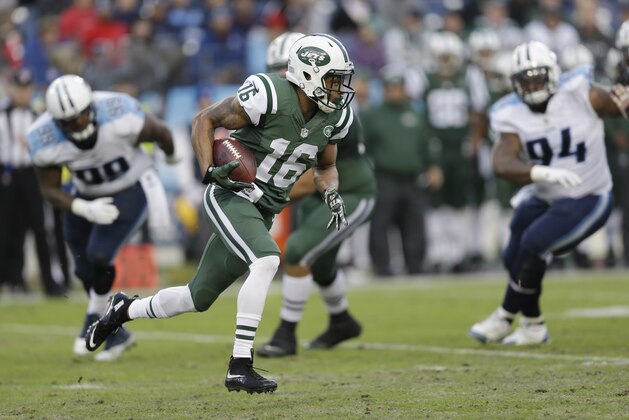 New York Jets wide receiver Percy Harvin (16) carries the ball against the Tennessee Titans in the first half of an NFL football game Sunday, Dec. 14, 2014, in Nashville, Tenn. (AP Photo/James Kenney)